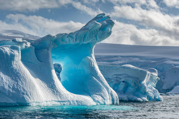 istock Weather eroded iceberg in Wilhemina Bay Antarctica 996105682