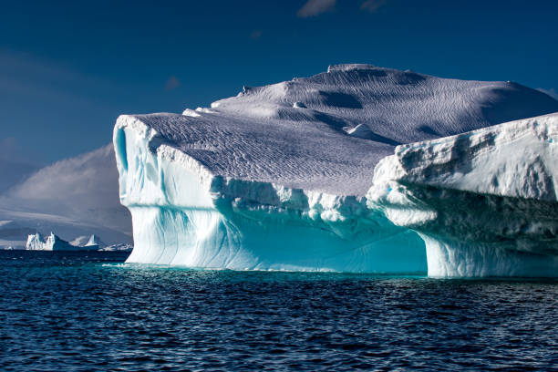 istock Weather eroded iceberg in Wilhemina Bay Antarctica 996106530