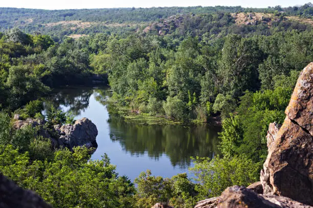 Photo of Southern Bug river landscape with famous rapid Red Gate or Integral in Migeya, Ukraine.