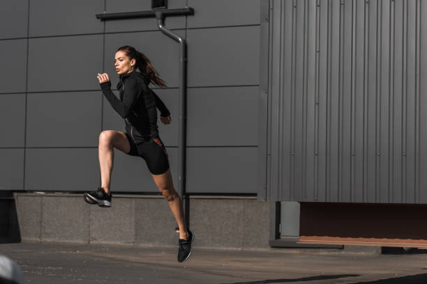 istock young concentrated sportive runner training in city 996134226