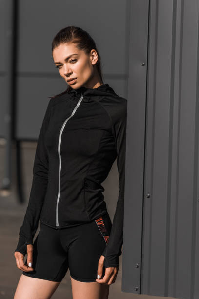 istock beautiful young sportswoman posing in thermal clothes 996144932