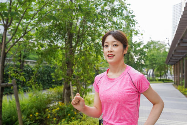istock Woman running in the city 996158520