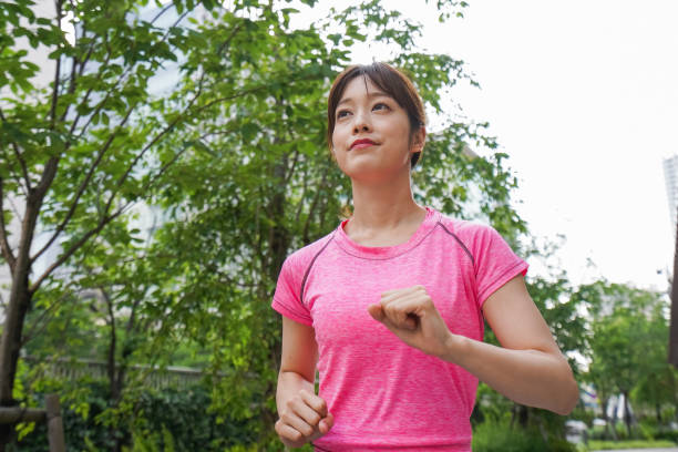 istock Woman running in the city 996158536