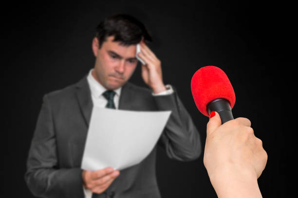 istock Nervous man is sweating, he afraid of public speech 996159804