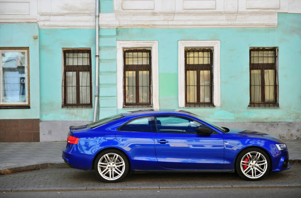 Toronto, ON, Canada - November 12, 2006: BMW 3 Series (E46) coupe in Titanium Silver Metallic parked in front of a brick wall.