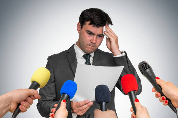 istock Nervous man is sweating, he afraid of public speech 996166660