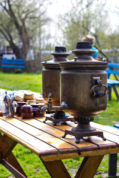 istock An old samovar on a table in the garden. 996168844