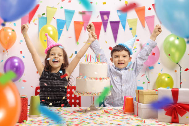 istock Overjoyed kids celebrating a birthday 996178064