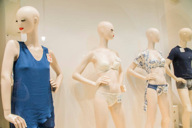istock mannequins on the shop window 996183646