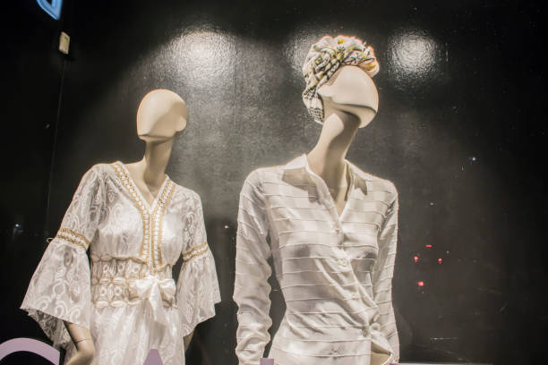 istock mannequins on the shop window 996183744