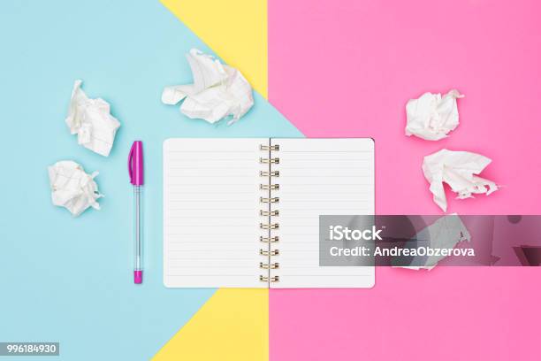 Writers Block Ideas Brainstorming Creativity Imagination Deadline Frustration Concept Top View Photo Of Office Desk With Blank Mock Up Open Notepad And Crumpled Paper On Pastel Background Stock Photo - Download Image Now