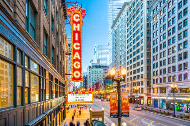 Chicago Theatre Marquee CHICAGO, ILLINOIS - MAY 10, 2018: The landmark Chicago Theatre on state Street at twilight. The historic theater dates from 1921. chicago illinois photos stock pictures, royalty-free photos & images