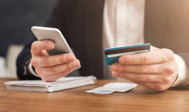 istock Man making online shopping by smartphone 996190858