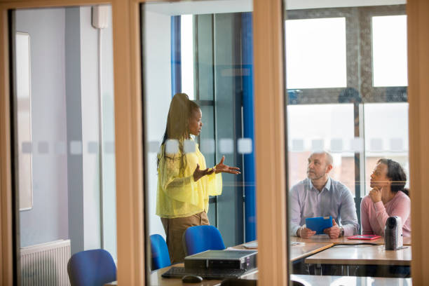 istock Engineering Tutors Hold a Meeting in the Staff Room 996196340