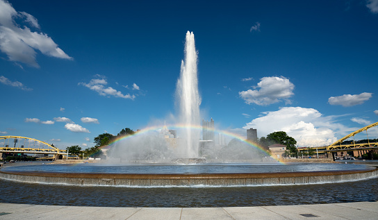 Panoramic shot of the fountain and rainbow at Point State Park in Pittsburgh PA