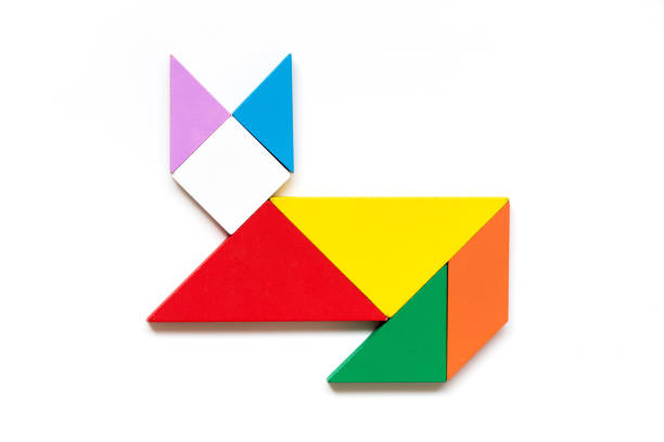 istock Color wood tangram puzzle in cat shape on white background 996200688