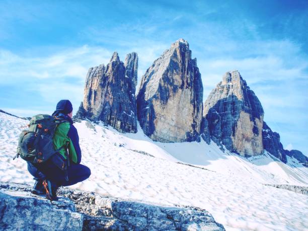 istock Man hiker with backpack on the Tre Cime di Lavaredo tour. 996207030