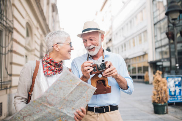 istock Woman looking at husband holding a camera 996237866