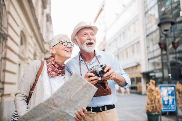 istock Elderly man preparing to capture the moment with his camera 996237870