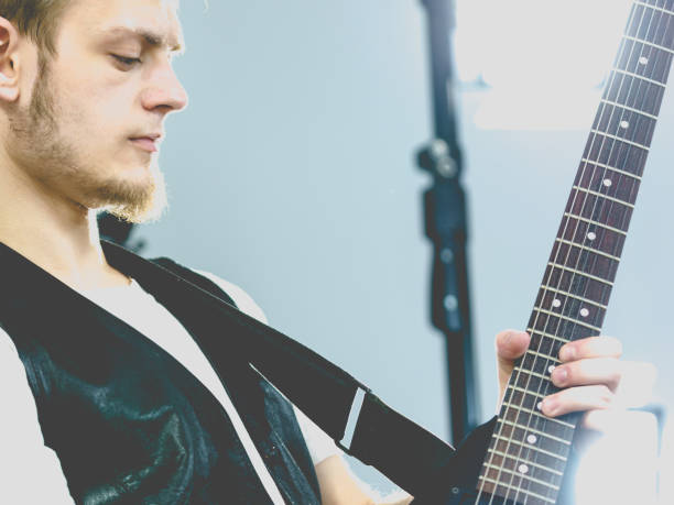 istock Man playing on electric guitar 996238550