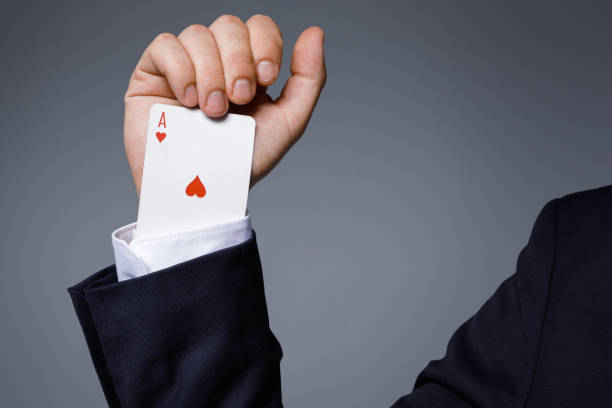 istock Man is hiding an Ace in the sleeve 996238824