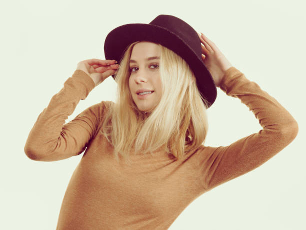istock Woman wearing suede and black hat 996245006