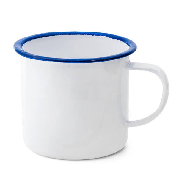 istock Blank enamel mug isolated on white background. Vintage cup made from tin material. ( Clipping path ) 996245078