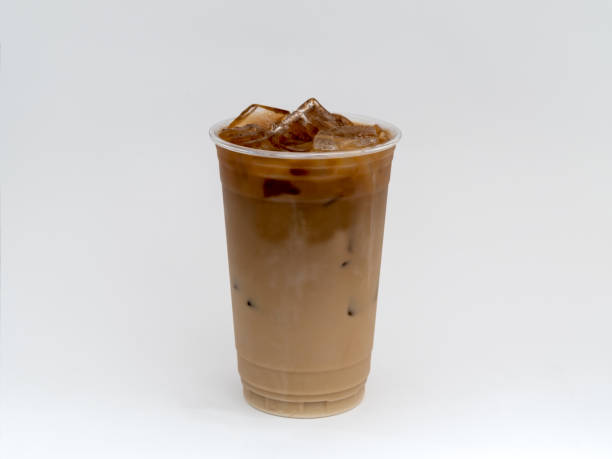 istock Cold Brew Iced Coffee in a clear cup on a white background with sweet cream. 996249320