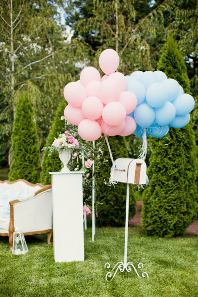 istock blue and pink balloons on mail box 996254940