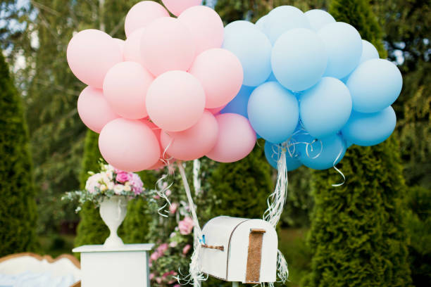 istock blue and pink balloons on mail box 996255168