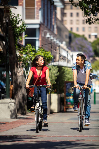 istock Los Angeles Couple Riding Bikes 996256006