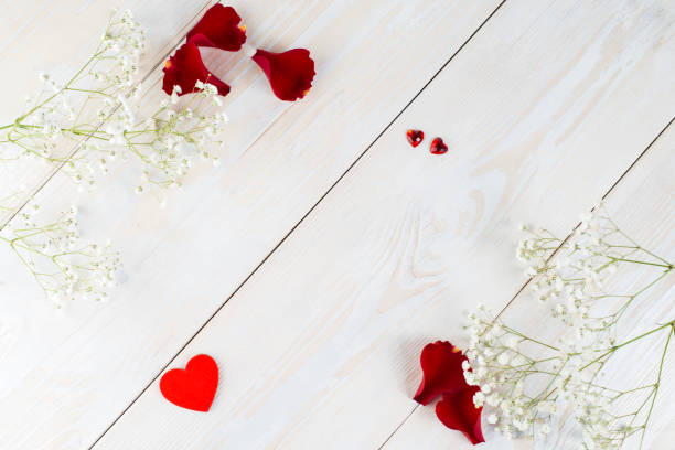 istock layout copy space for text wooden background with flowers, heart 996256862