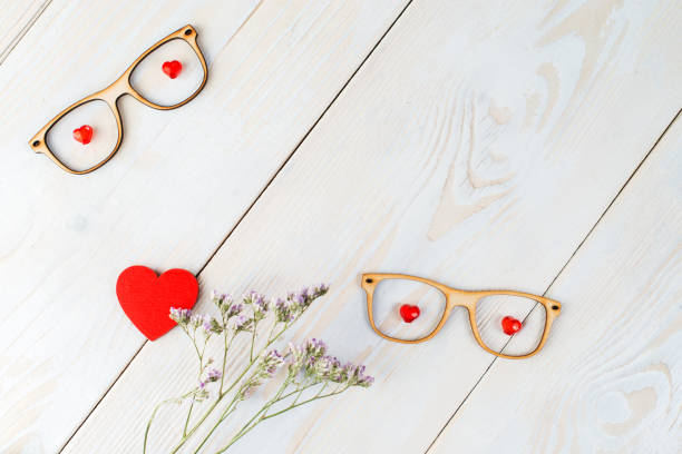 istock layout copy space for text wooden background with flowers, heart 996257174