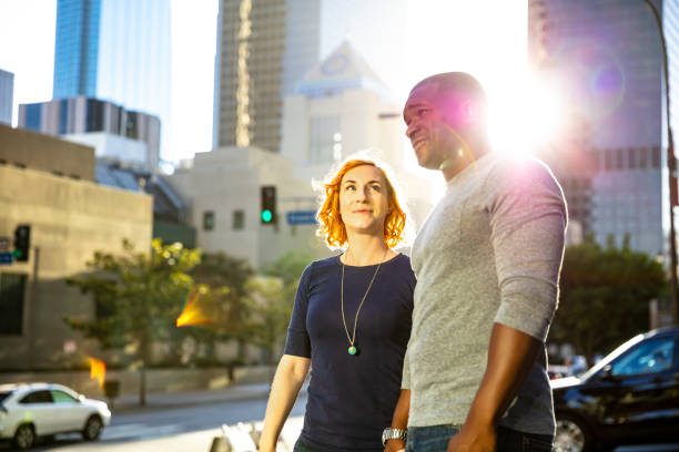 istock LA Couple Walking Past Downtown Public Library at Sunset 996260586
