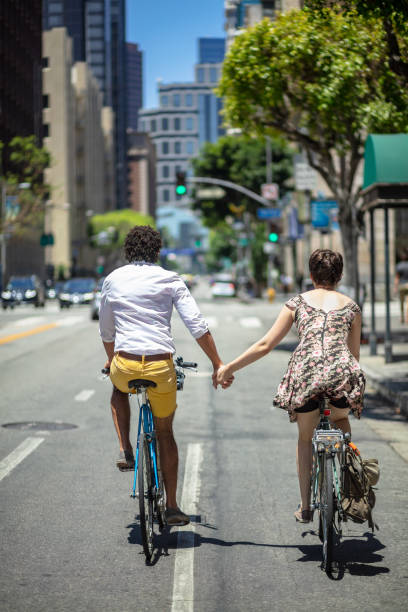 istock Couple Cycling Through Downtown Los Angeles 996262328