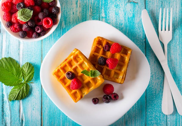 istock waffle dessert fruit berries fresh sweet wooden background. 996266870