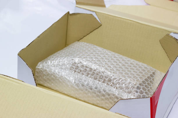istock hand man hold bubble pack, for Packing and protection product cracked or insurance During transit. 996272292