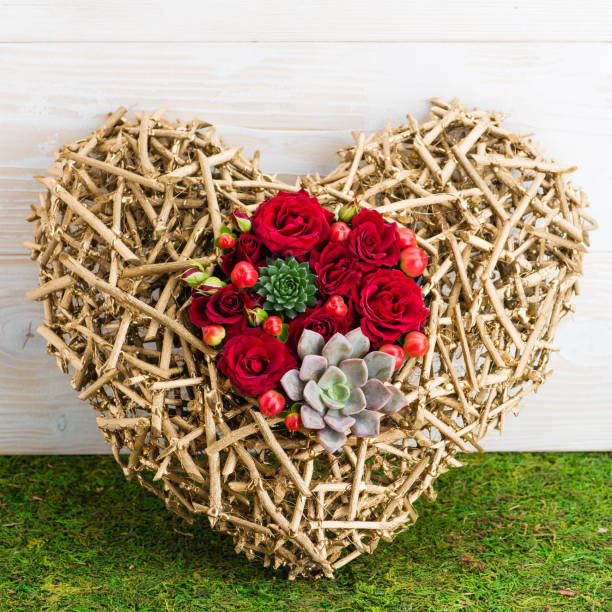 istock heart with fresh flower Valentine's Day 996272744
