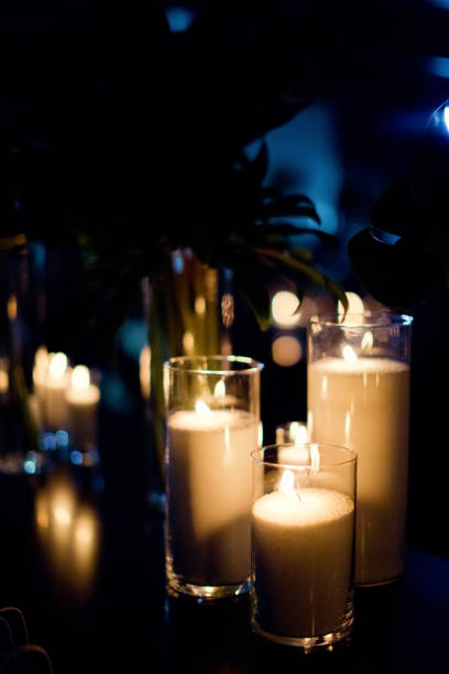 istock burning candles in glass vases 996273010