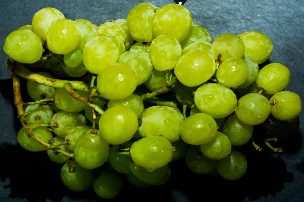 istock Bunch of delicious and fresh white grapes 996279792