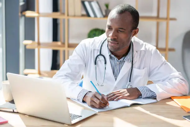 Photo of Concentrated foreigner preparing his scientific work