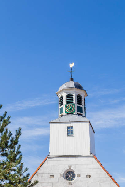 istock White wooden church tower 996314926