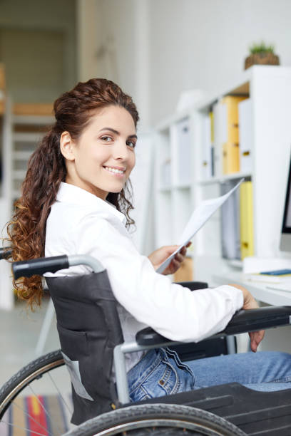 istock Young accountant in wheelchair 996320586
