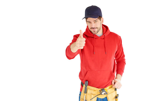 istock Young repairman with tool belt 996320724