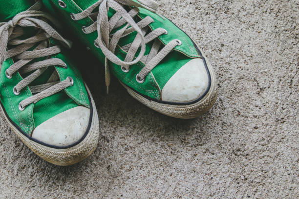 istock green shoe, sneakers with filter effect retro vintage style 996323140