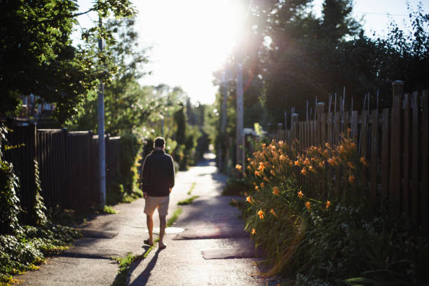 istock A mature man in an alley at sunset 996340304