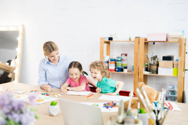 istock Happy Kids in Art Class 996341072