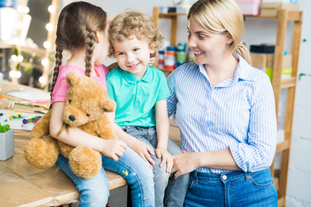 istock Happy Young Mother with Two Kids 996341150