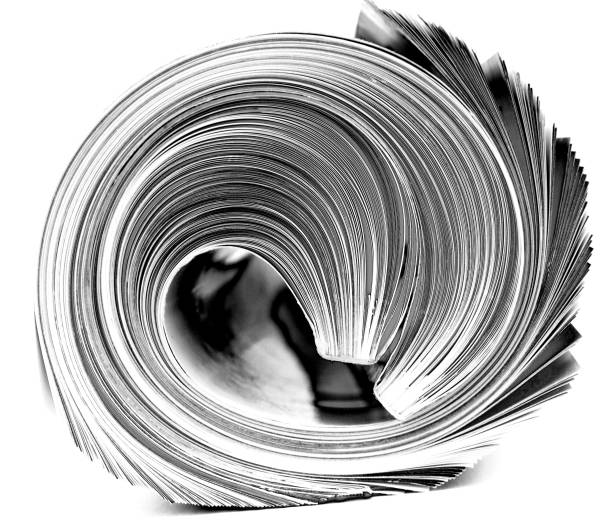rolled up magazine   monochrome isolated on white - tabloid newspaper rolled up journalist imagens e fotografias de stock