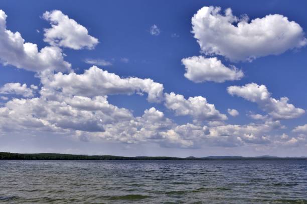 istock view of the blue sky over the lake with clouds 996346012